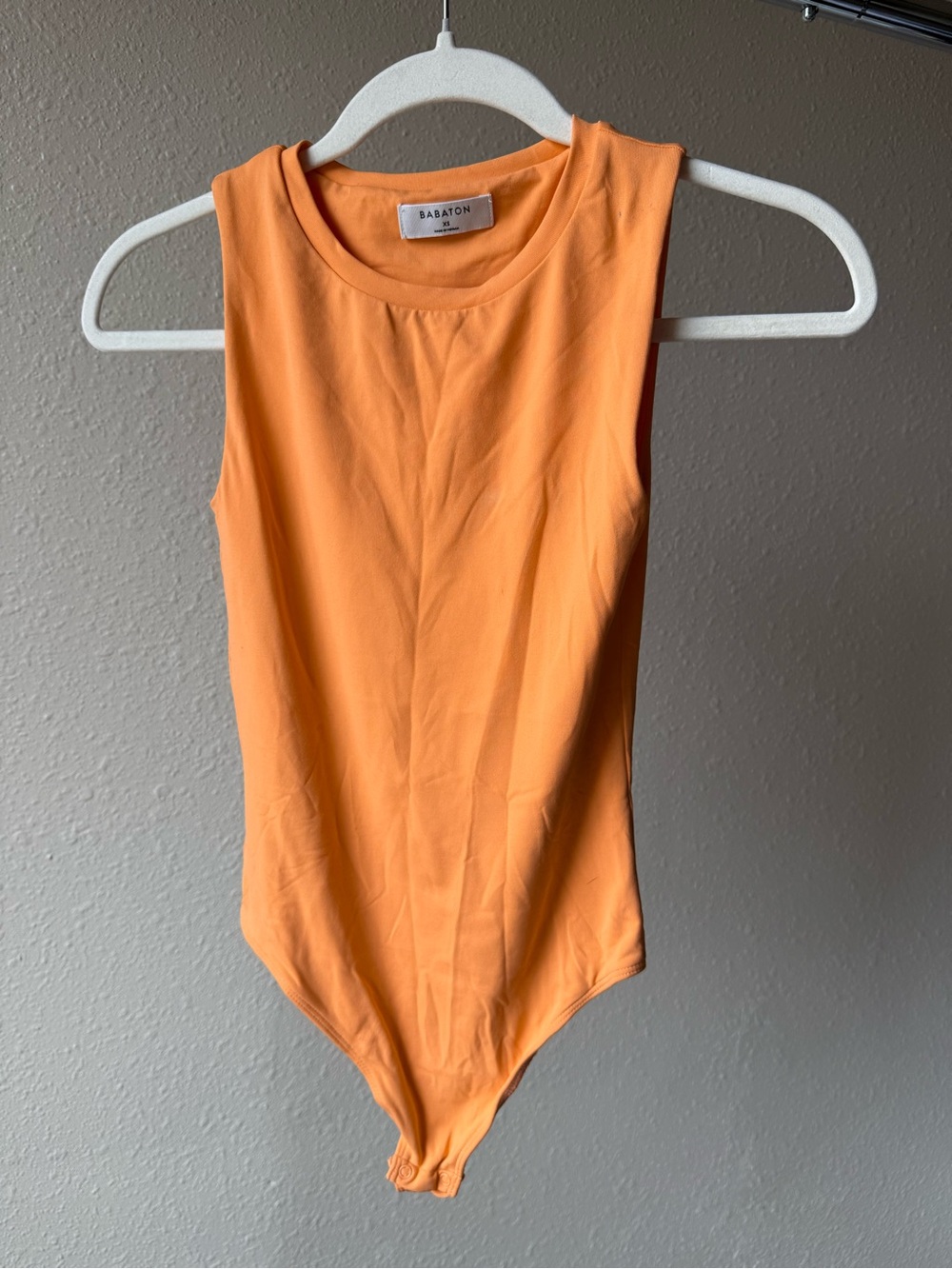 Babaton Orange Sleeveless Kids Bodysuit